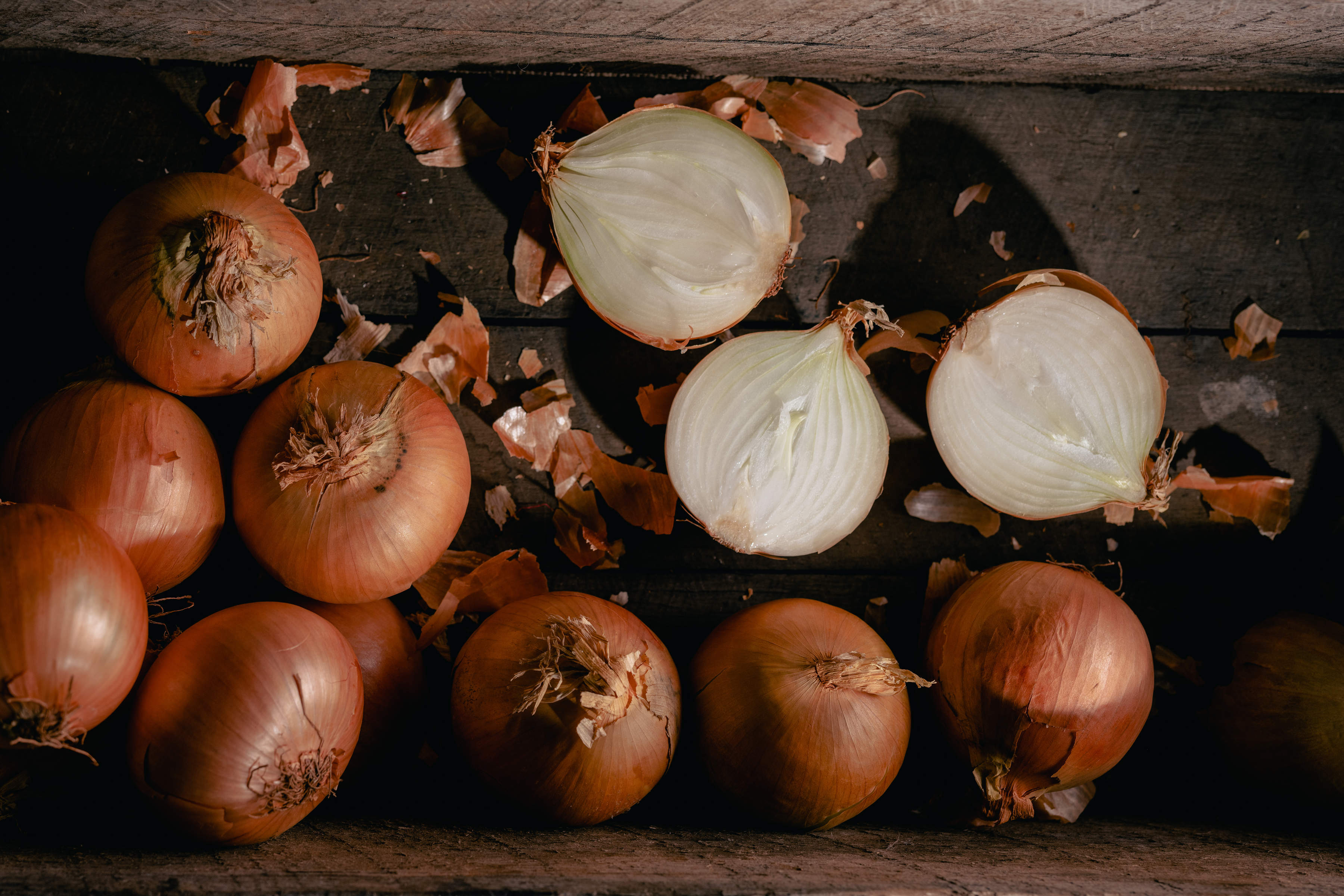 Tasmanian brown onions, some cut in half. Photo: Andrew Wilson.